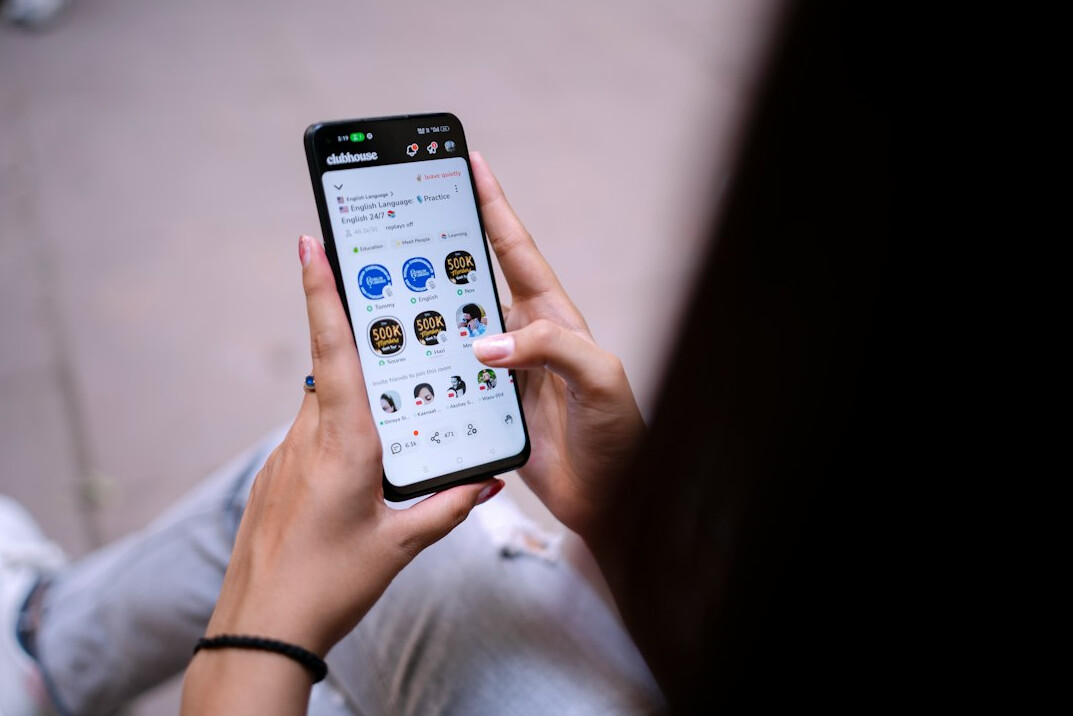 person scrolling social media on phone